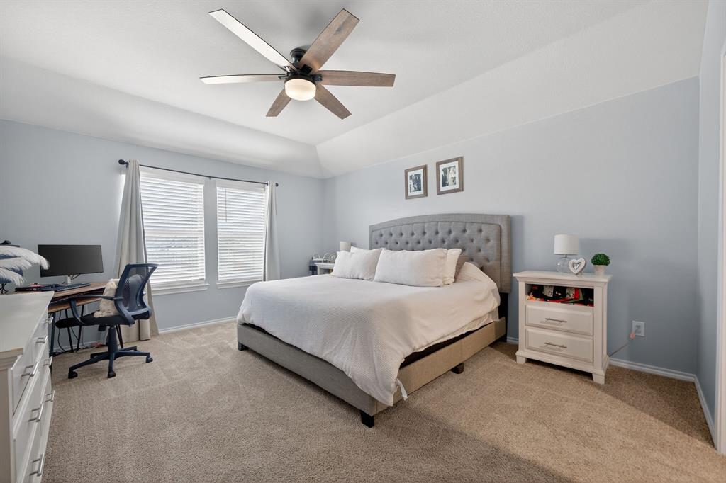 800 Rustic Way Royse City, TX 75189 - Photo 15 of 21 a bedroom with a bed and a large window