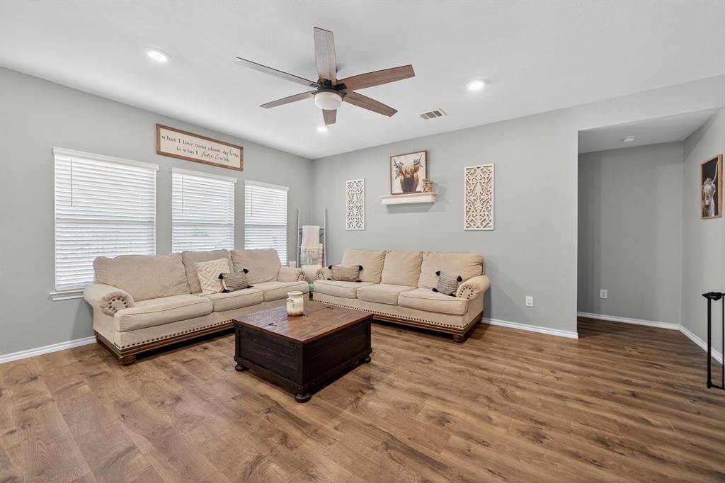 800 Rustic Way Royse City, TX 75189 - Photo 6 of 21 a living room with furniture and a large window