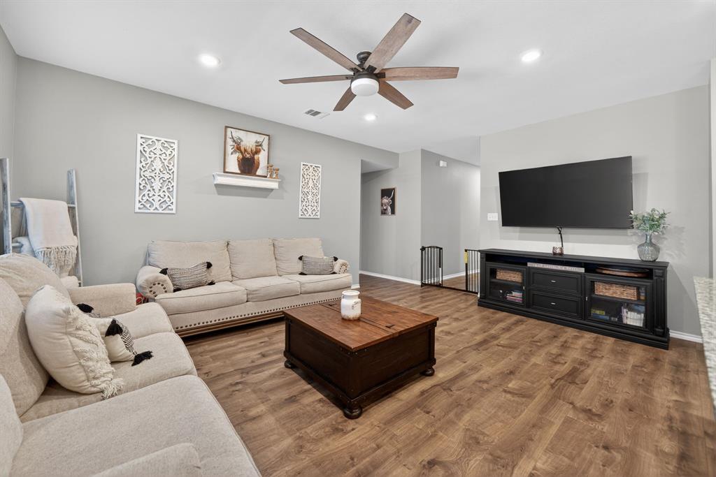 800 Rustic Way Royse City, TX 75189 - Photo 7 of 21 a living room with furniture and a flat screen tv