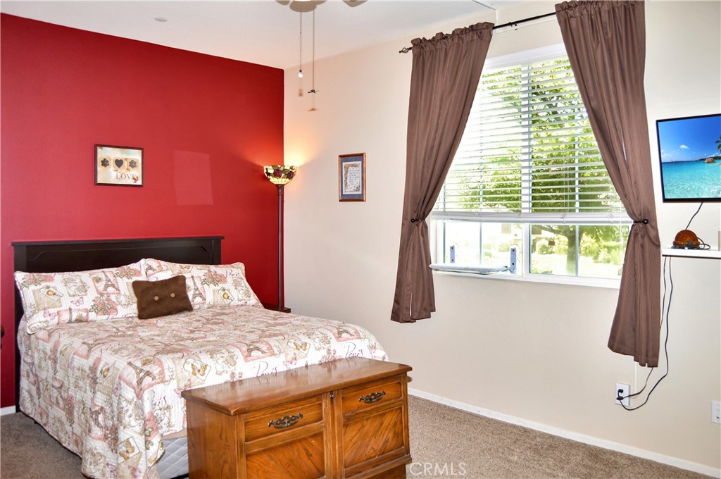 166 Fox Lane Calimesa, CA 92320 - Photo 51 of 76 3rd Bedroom with Ceiling Fan and Cozy Carpet