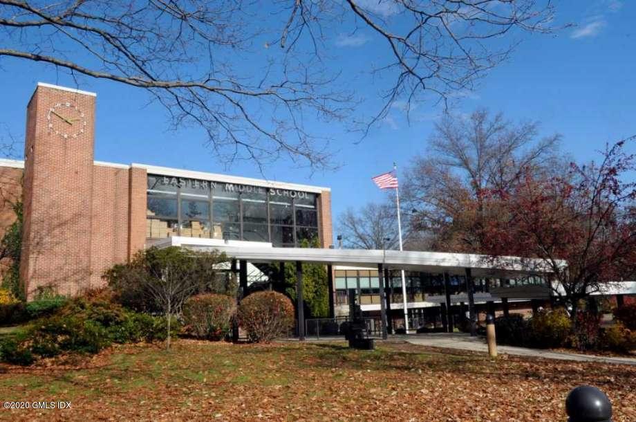 2 Winthrop Drive Riverside, CT 06878 - Photo 9 of 10 a front view of a building with sitting area