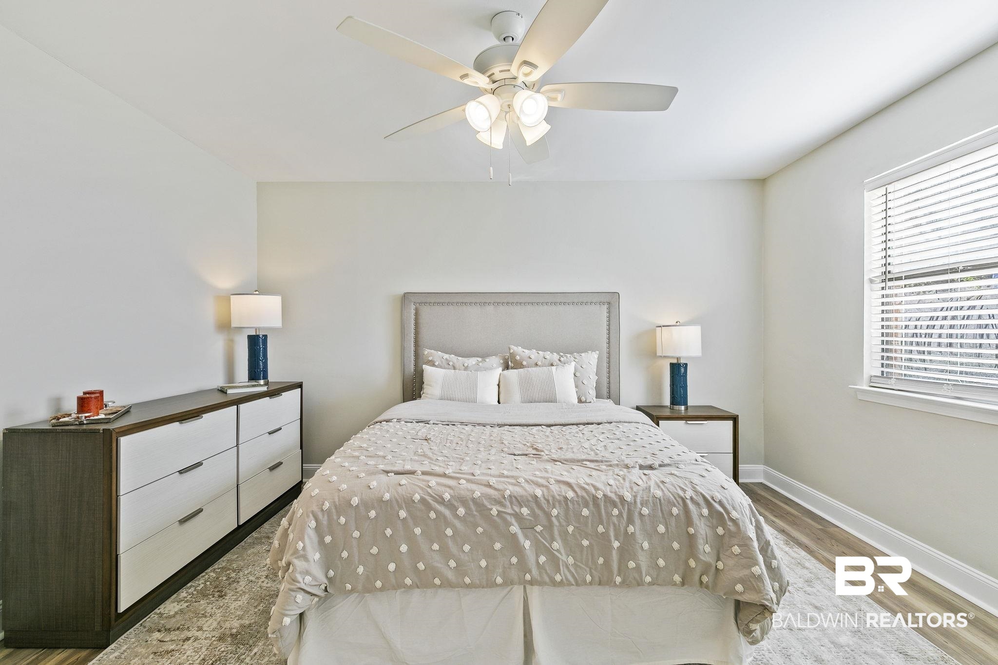 110 5th Street, Unit C103 Daphne, AL 36526 - Photo 29 of 46 Bedroom featuring ceiling fan and light hardwood / wood-style flooring