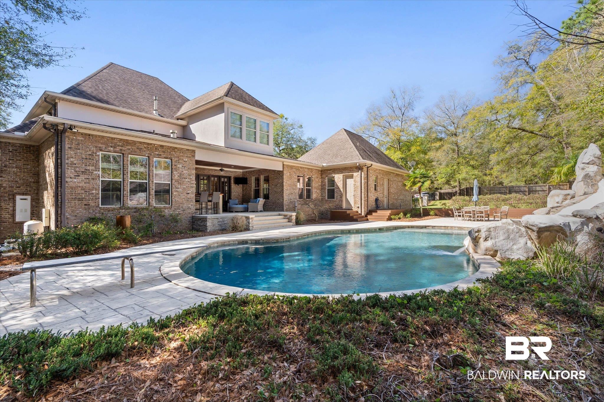 7676 Rockstone Lane Mobile, AL 36695 - Photo 35 of 47 Swimming pool with a patio