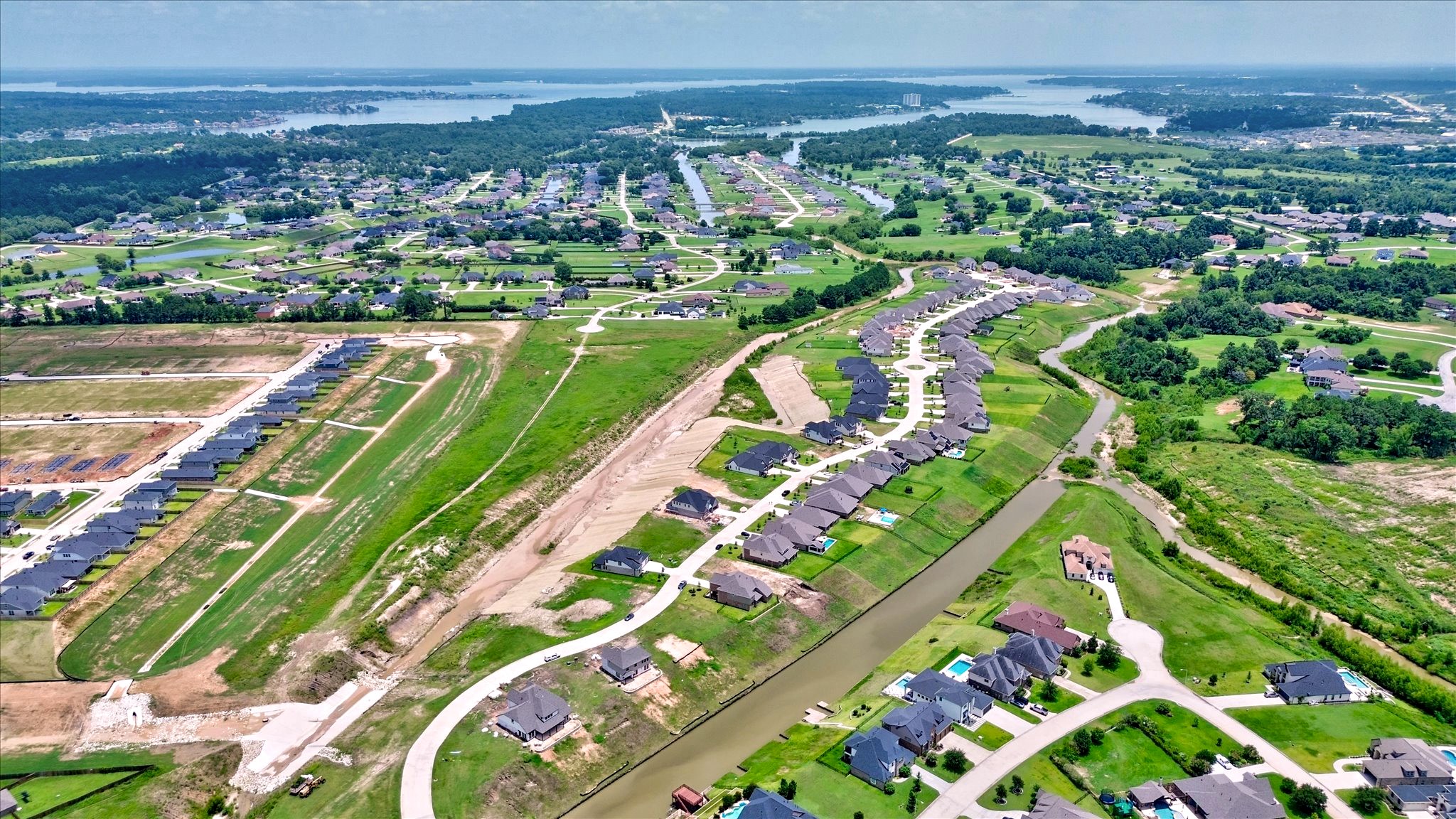141 Peninsula Point Drive Montgomery, TX 77356 - Photo 47 of 47 Panoramic shot of the Waterstone and Peninsula neighborhoods, just minutes from Lake Conroe. Enjoy quiet streets, thoughtfully designed communities, and nature right outside your door.