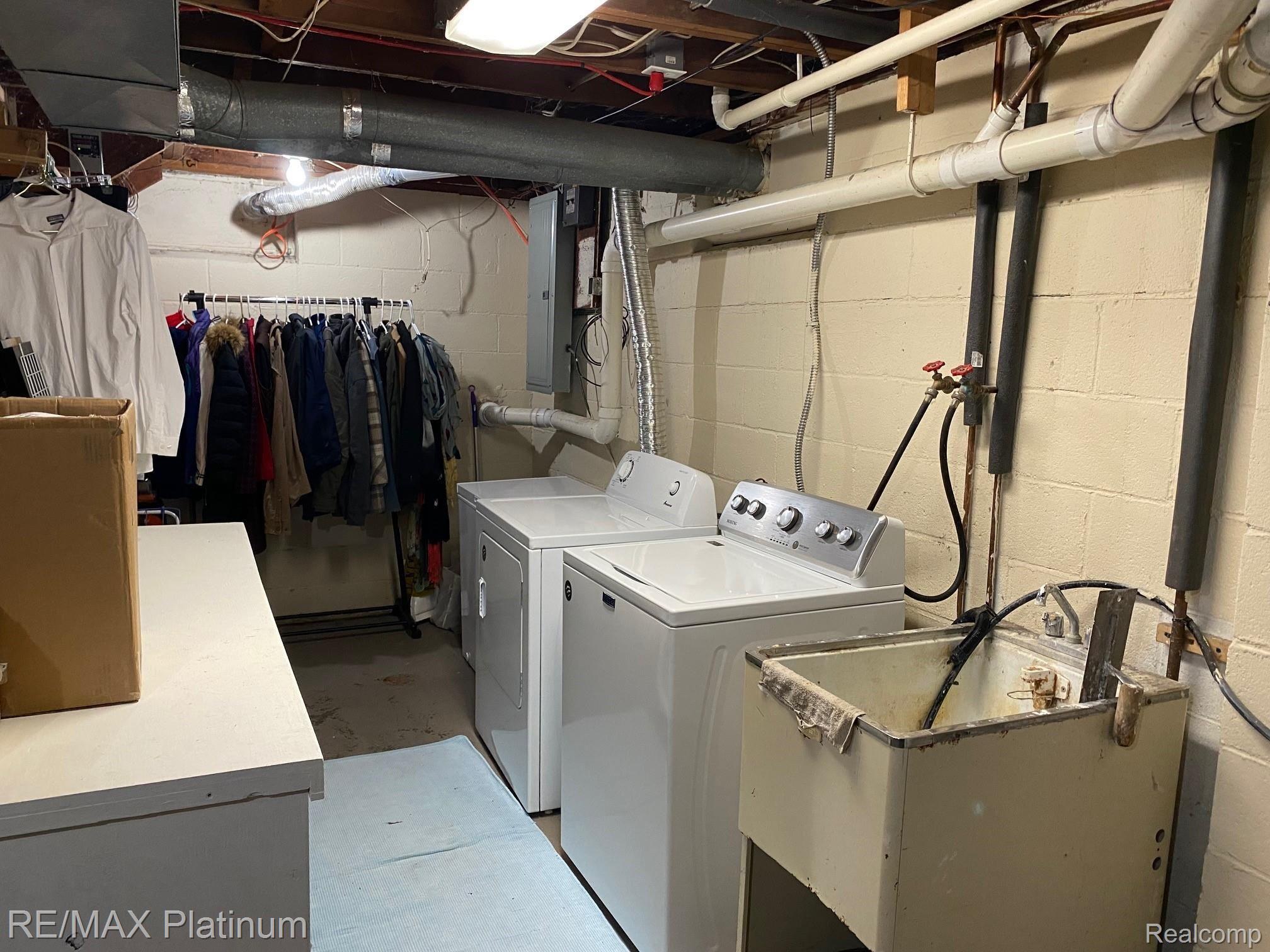 4450 North Eager Road Howell, MI 48855 - Photo 20 of 23 Basement Laundry Area