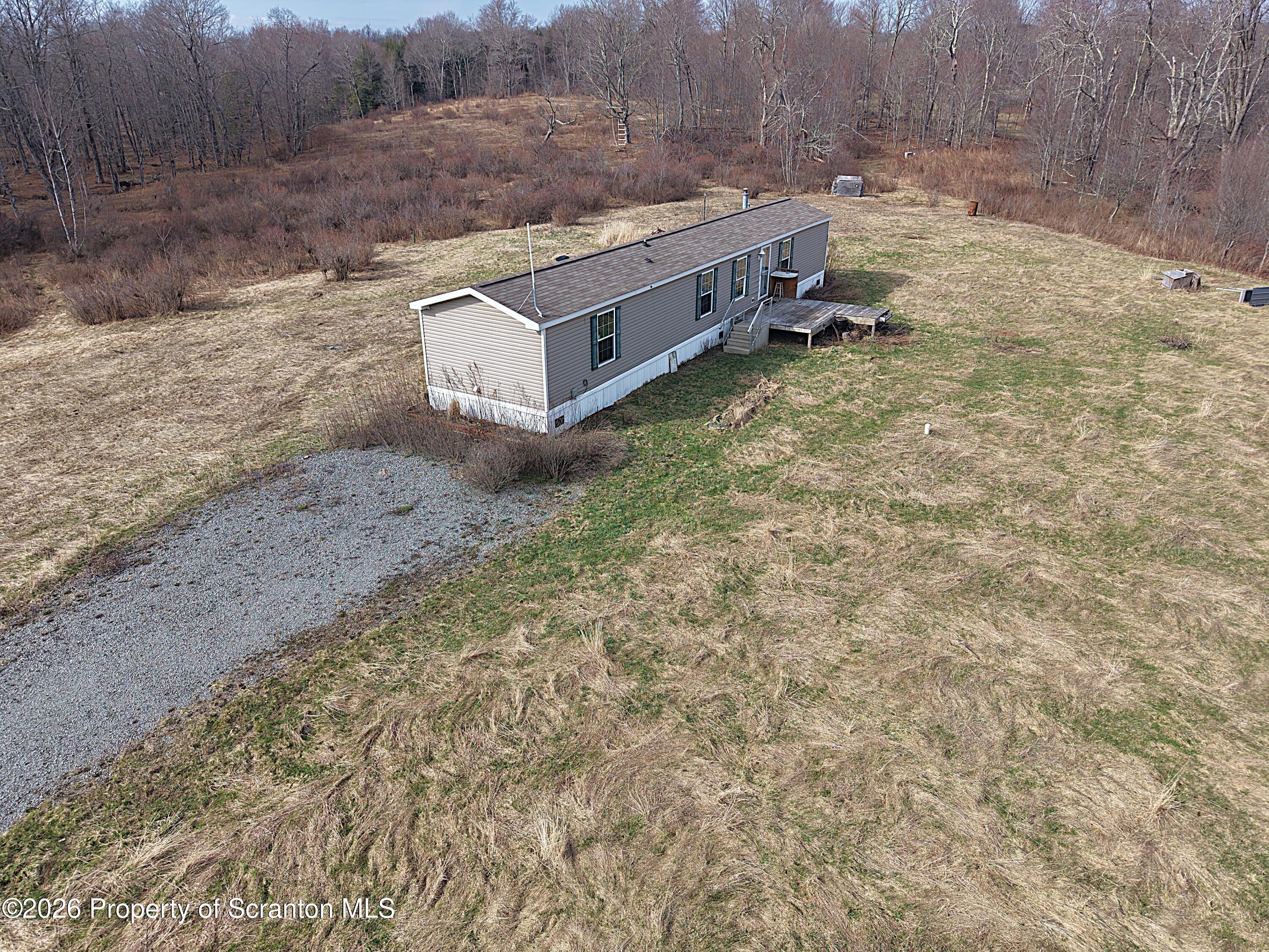 65 Ross Hill Road Thompson, PA 18465 - Photo 1 of 26 Elevated Front Corner