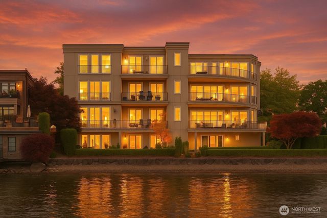 a front view of a building with lake view and a window