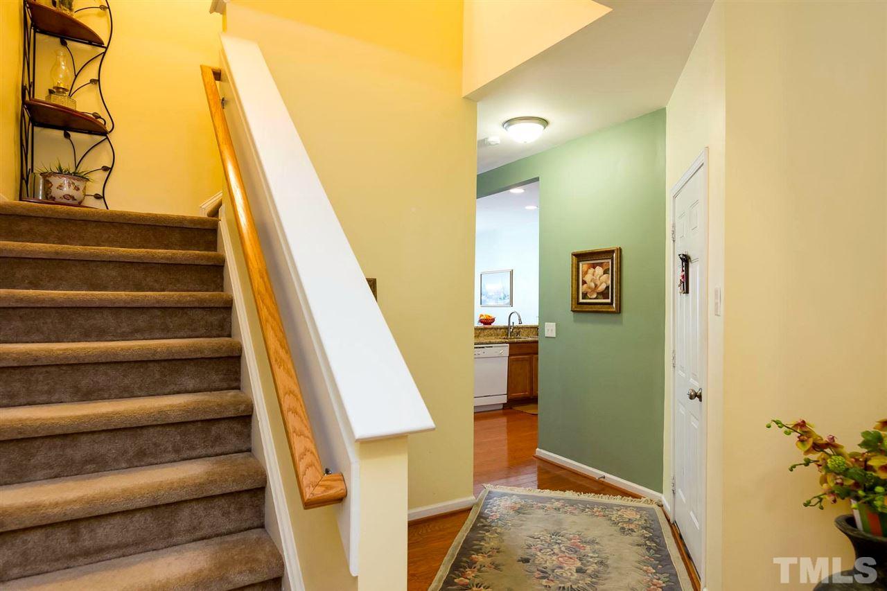 8228 Belneath Court Raleigh, NC 27613 - Photo 2 of 17 a view of entryway with furniture and wooden floor