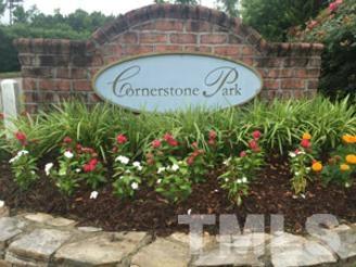 8228 Belneath Court Raleigh, NC 27613 - Photo 17 of 17 a sign that is sitting in front of flowers