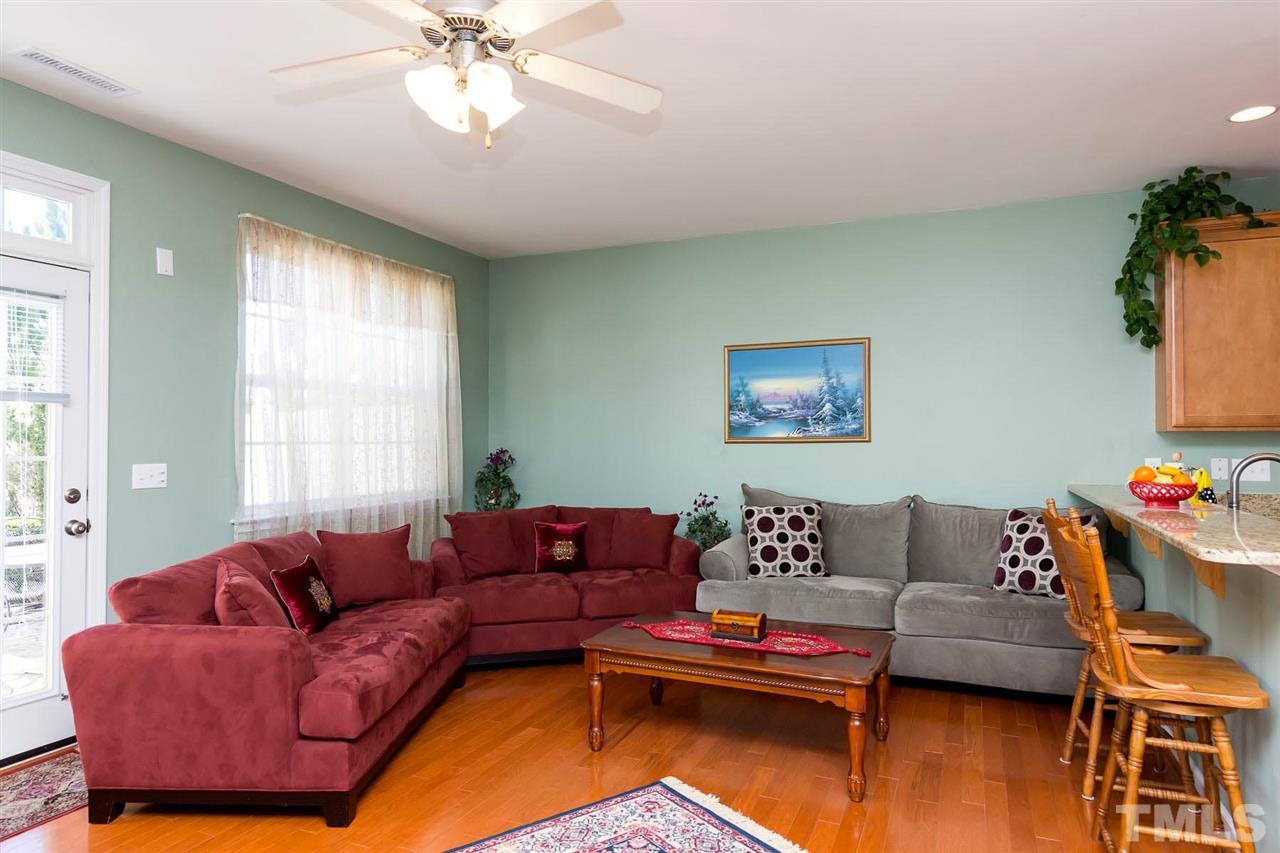 8228 Belneath Court Raleigh, NC 27613 - Photo 7 of 17 a living room with furniture and a window