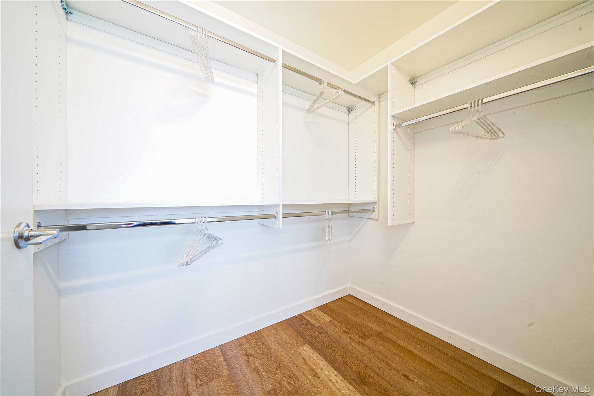 50 Clinton Place, Unit LOCUST STREET New Rochelle, NY 10801 - Photo 15 of 15 a view of a room with wooden floor