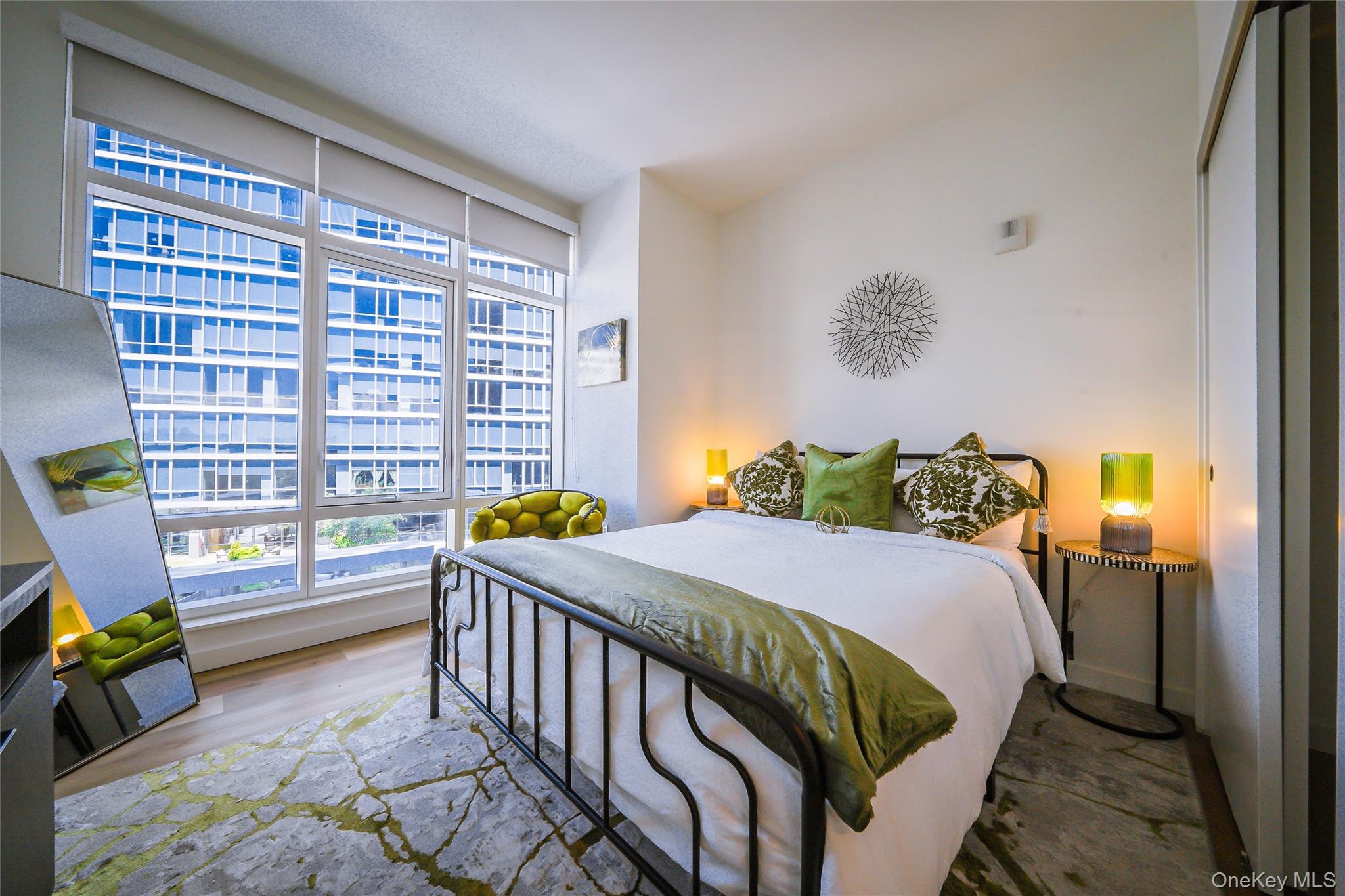 50 Clinton Place, Unit LOCUST STREET New Rochelle, NY 10801 - Photo 3 of 15 a bedroom with a bed and a window