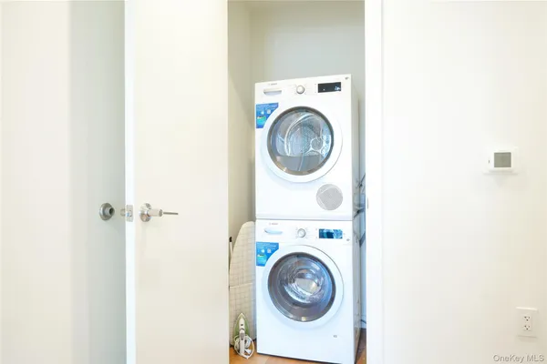 a utility room with dryer and washer