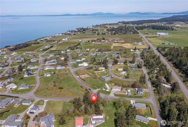 a view of a city with an ocean