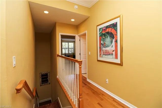 a view of a hallway with workspace