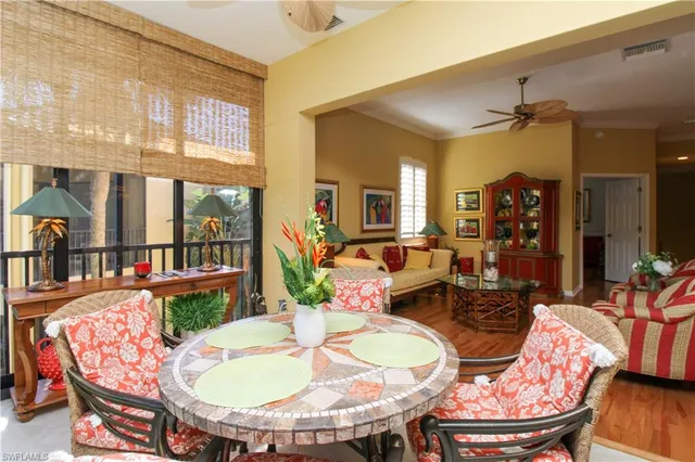 a dining room with furniture a table and closet