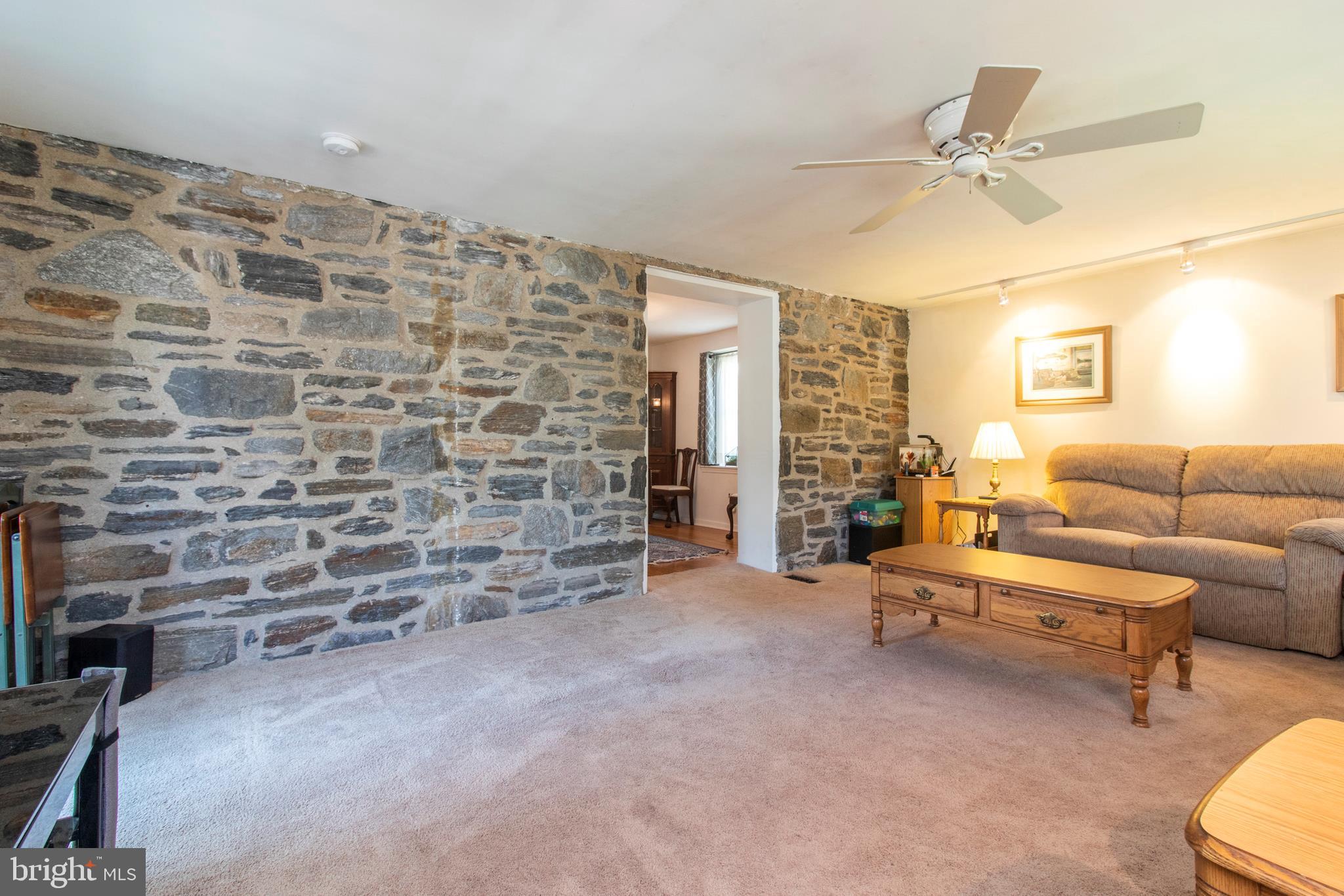 496 Maplewood Road Springfield, PA 19064 - Photo 10 of 35 Family Room/ Exposed Stone Wall