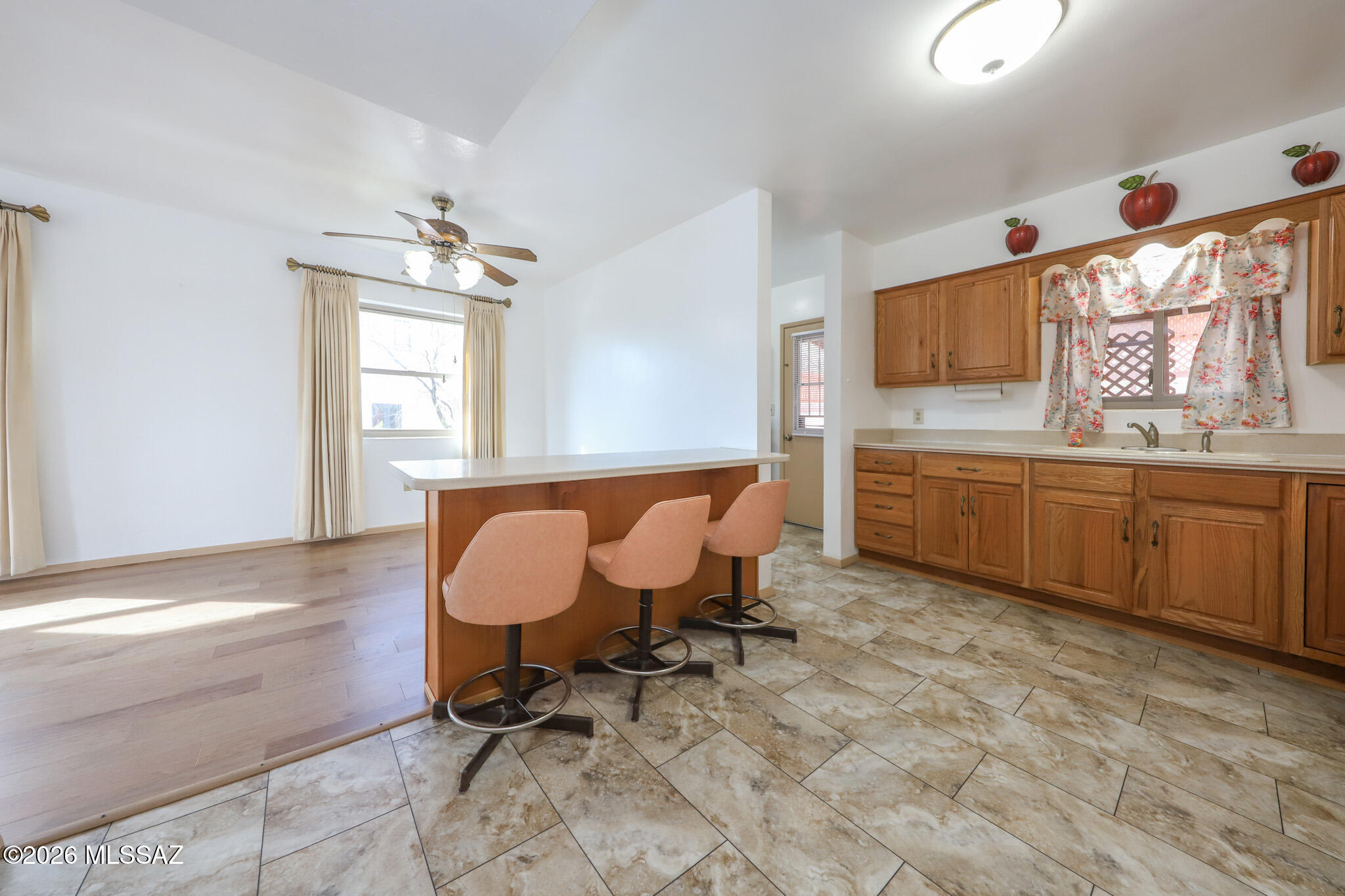 37 North Silverbell Road Tucson, AZ 85745 - Photo 8 of 31 a view of a kitchen with a sink and a window