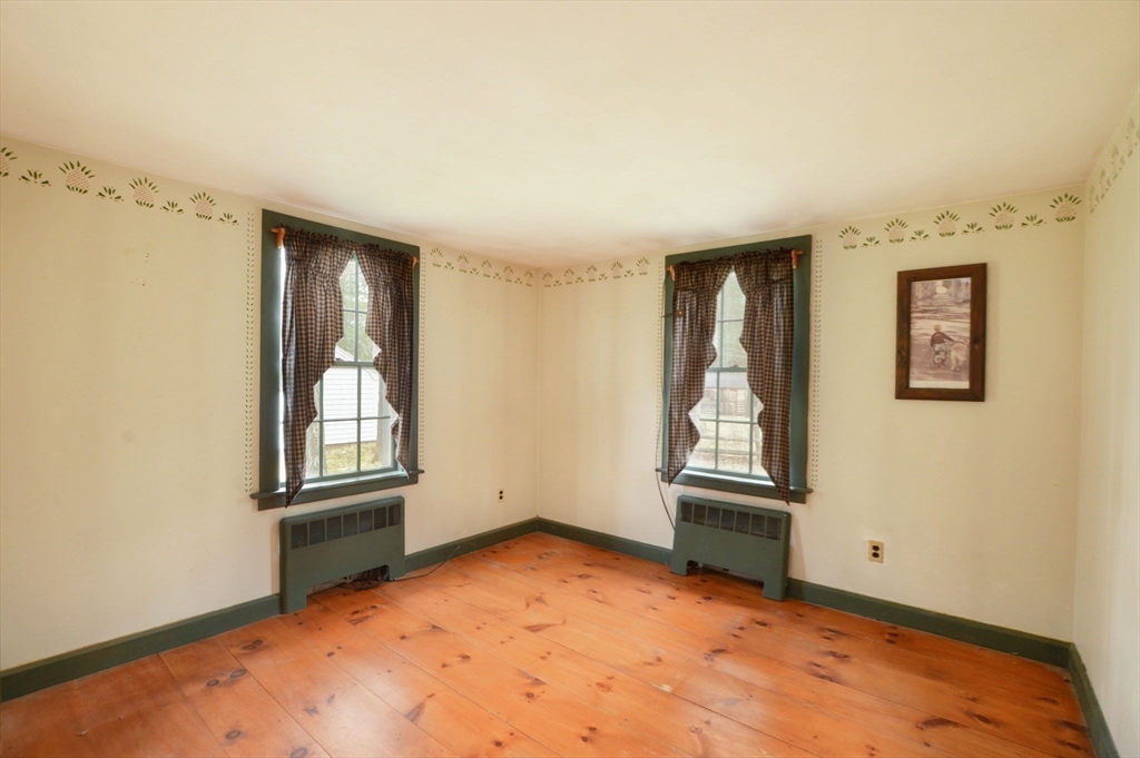 158 Great Neck Road Wareham, MA 02571 - Photo 17 of 42 an empty room with windows and closet