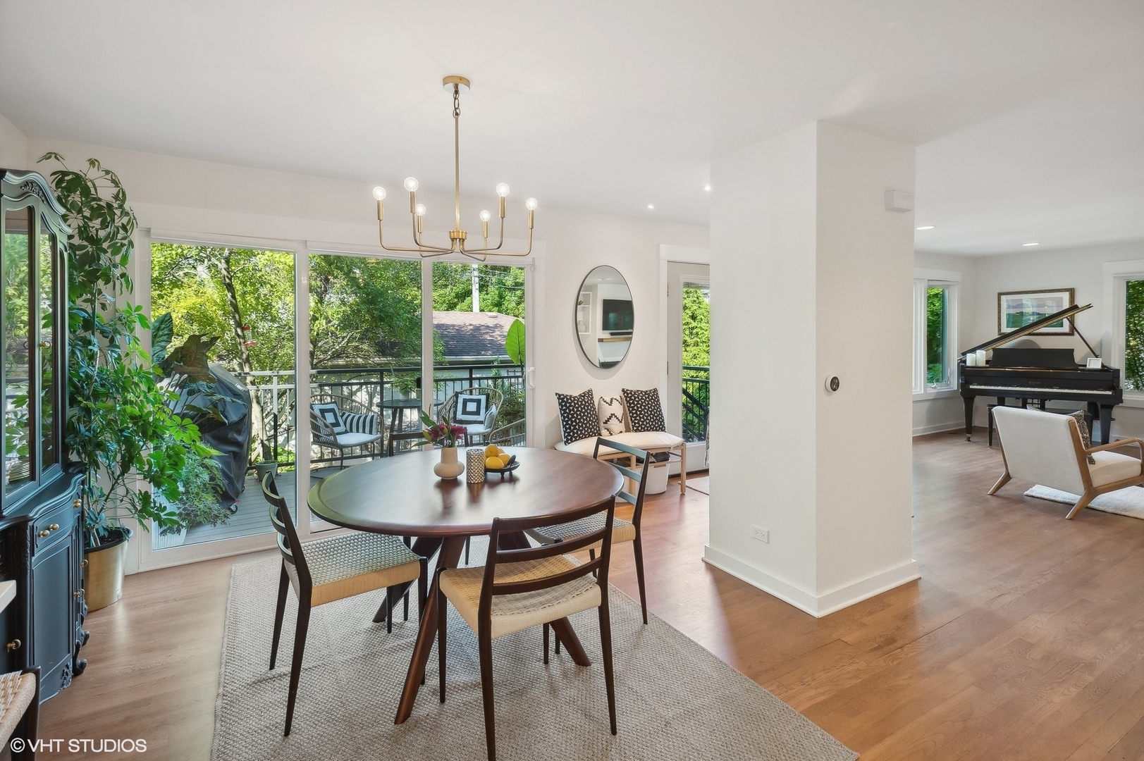 4554 North Paulina Street, Unit 5 Chicago, IL 60640 - Photo 15 of 37 a view of a dining room with furniture window and outside view