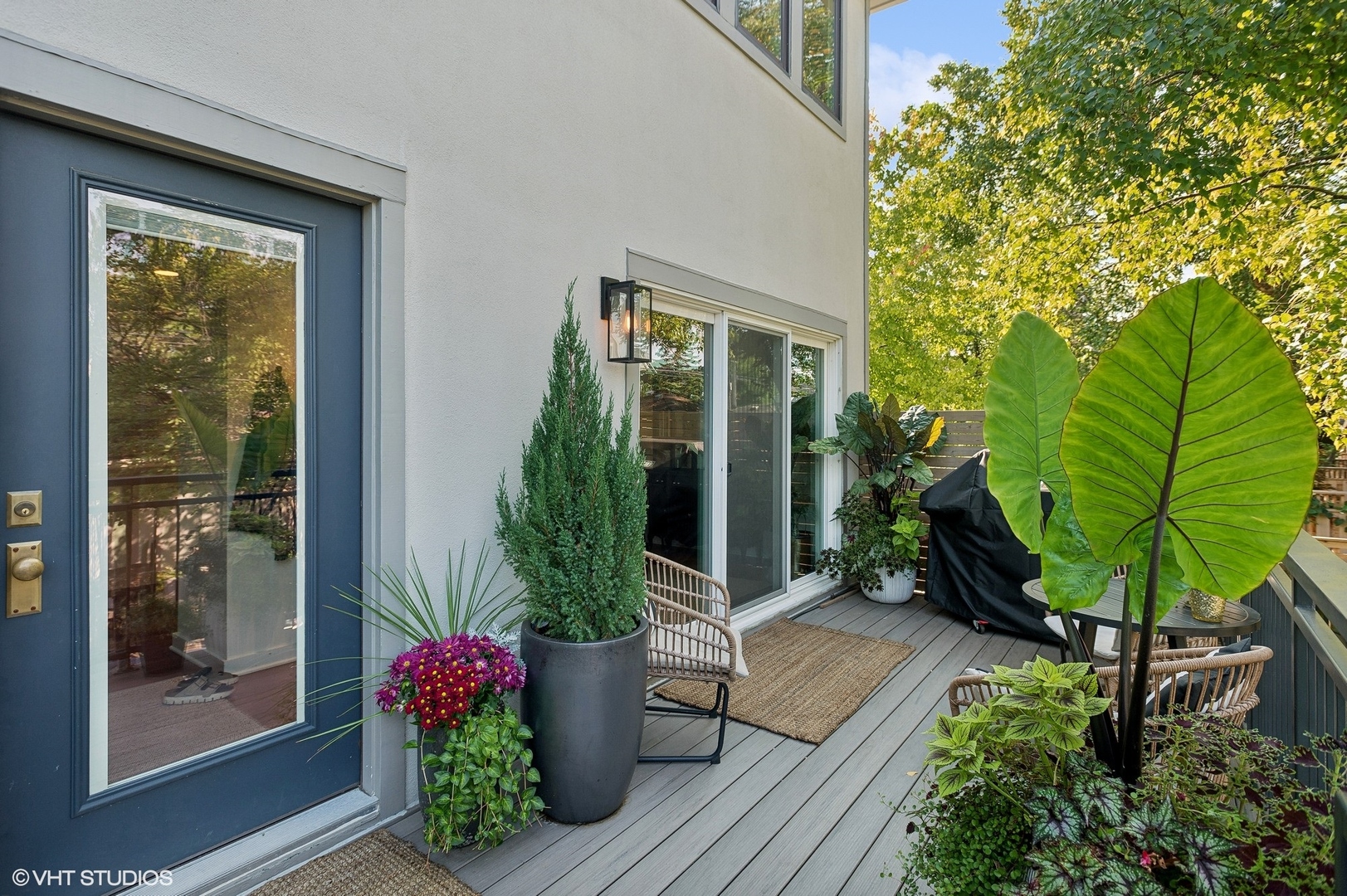 4554 North Paulina Street, Unit 5 Chicago, IL 60640 - Photo 2 of 37 a house with lots of trees in front of it