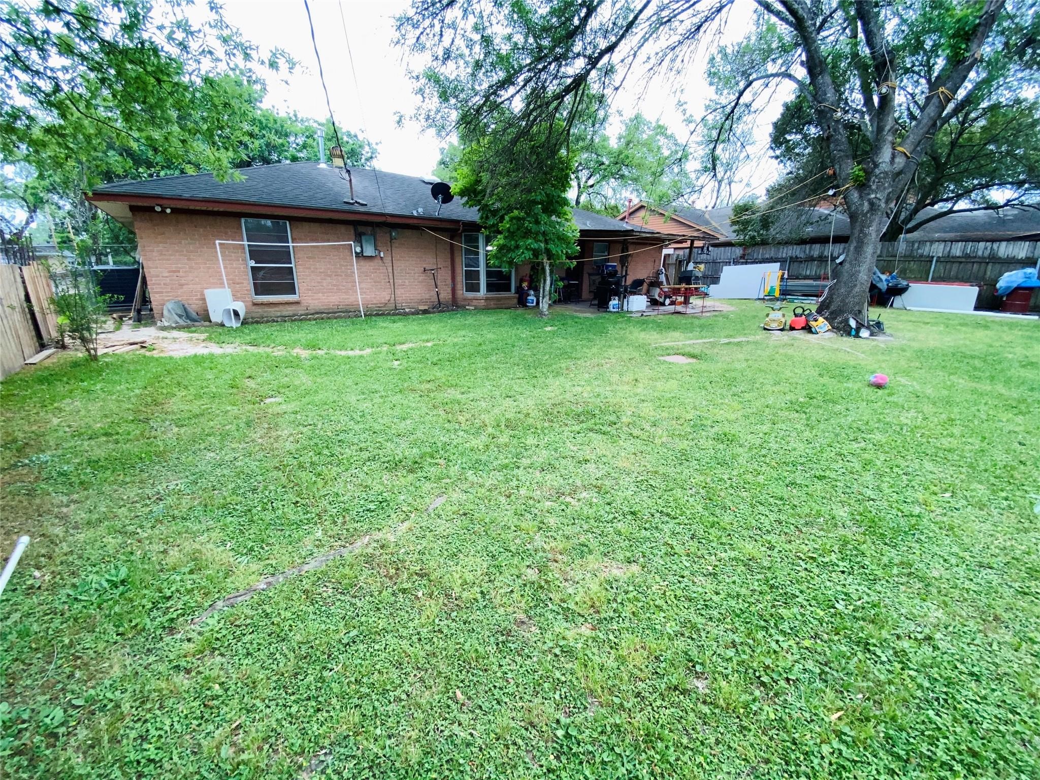 14107 Waterville Way Houston, TX 77015 - Photo 12 of 12 a view of house with backyard