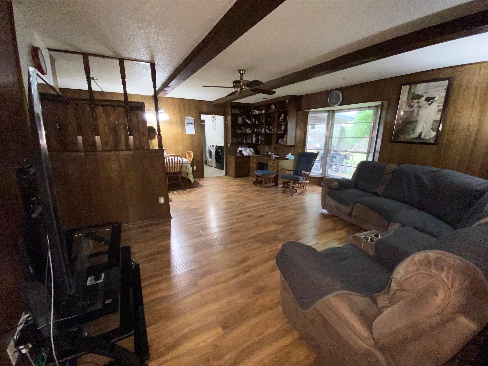 14107 Waterville Way Houston, TX 77015 - Photo 4 of 12 a living room with furniture and wooden floor