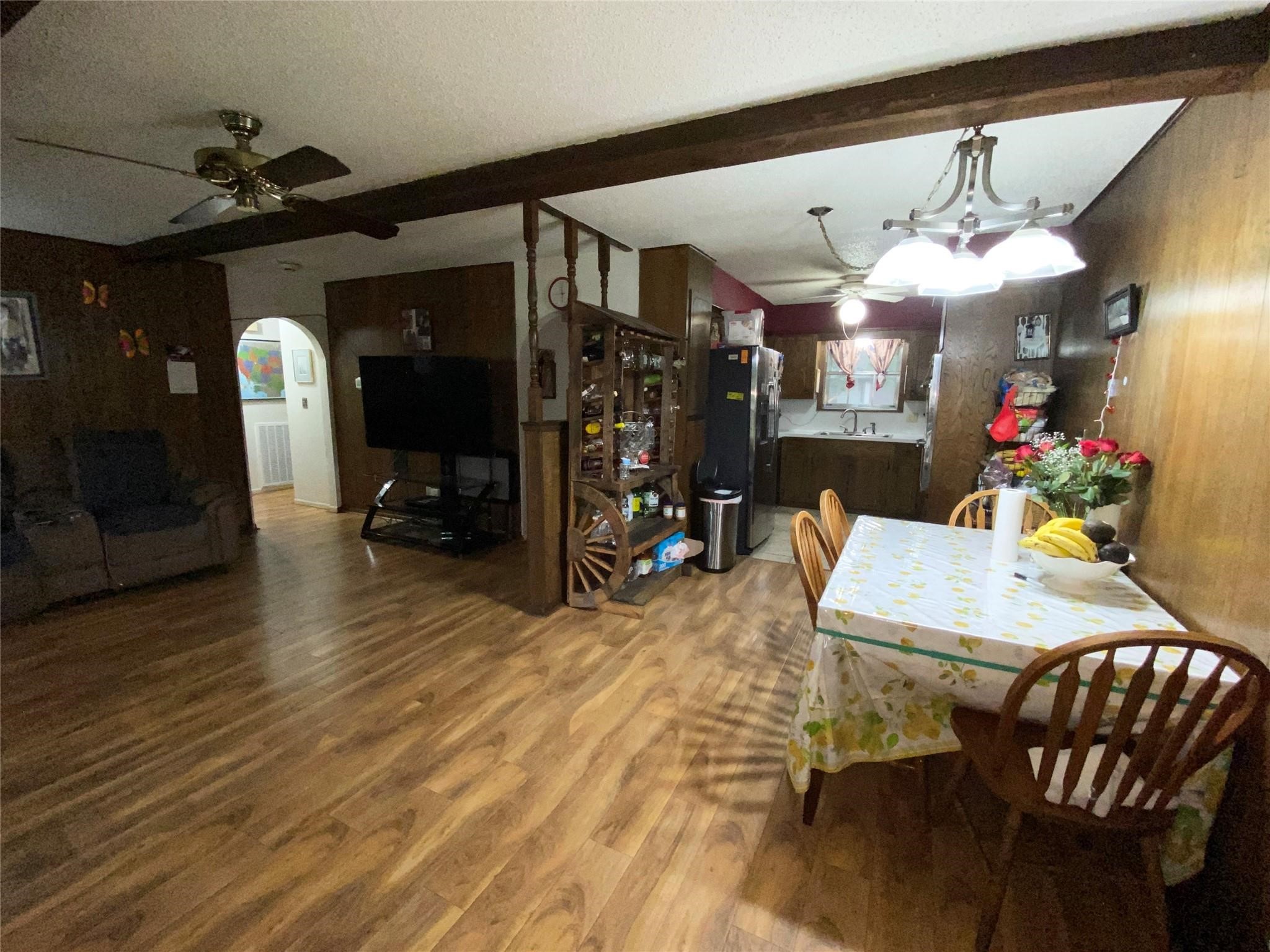 14107 Waterville Way Houston, TX 77015 - Photo 6 of 12 a view of a dining room with furniture and wooden floor