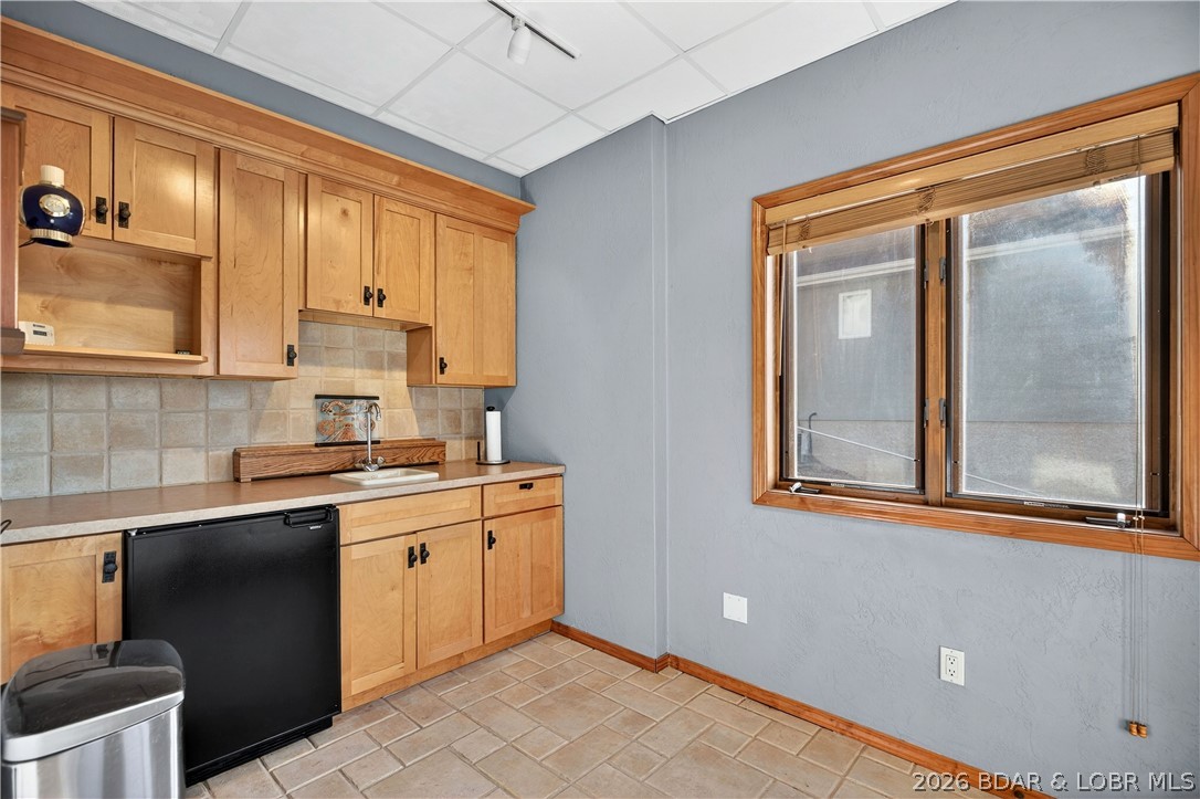 177 Ridgewood Drive Lake Ozark, MO 65049 - Photo 24 of 40 Kitchenette & Lower Level Walk-Out