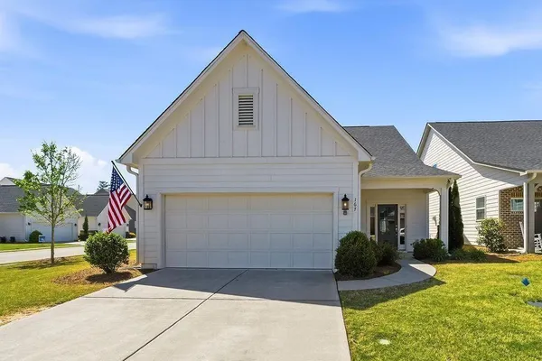 a front view of house with yard