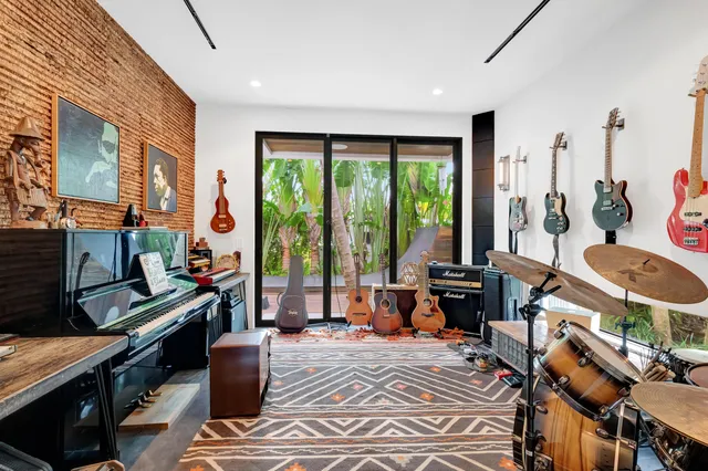 a utility room with sink dryer and washer