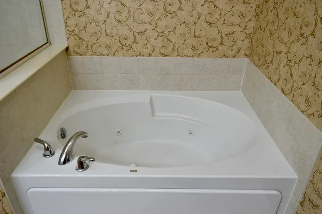 a bathroom with a bathtub