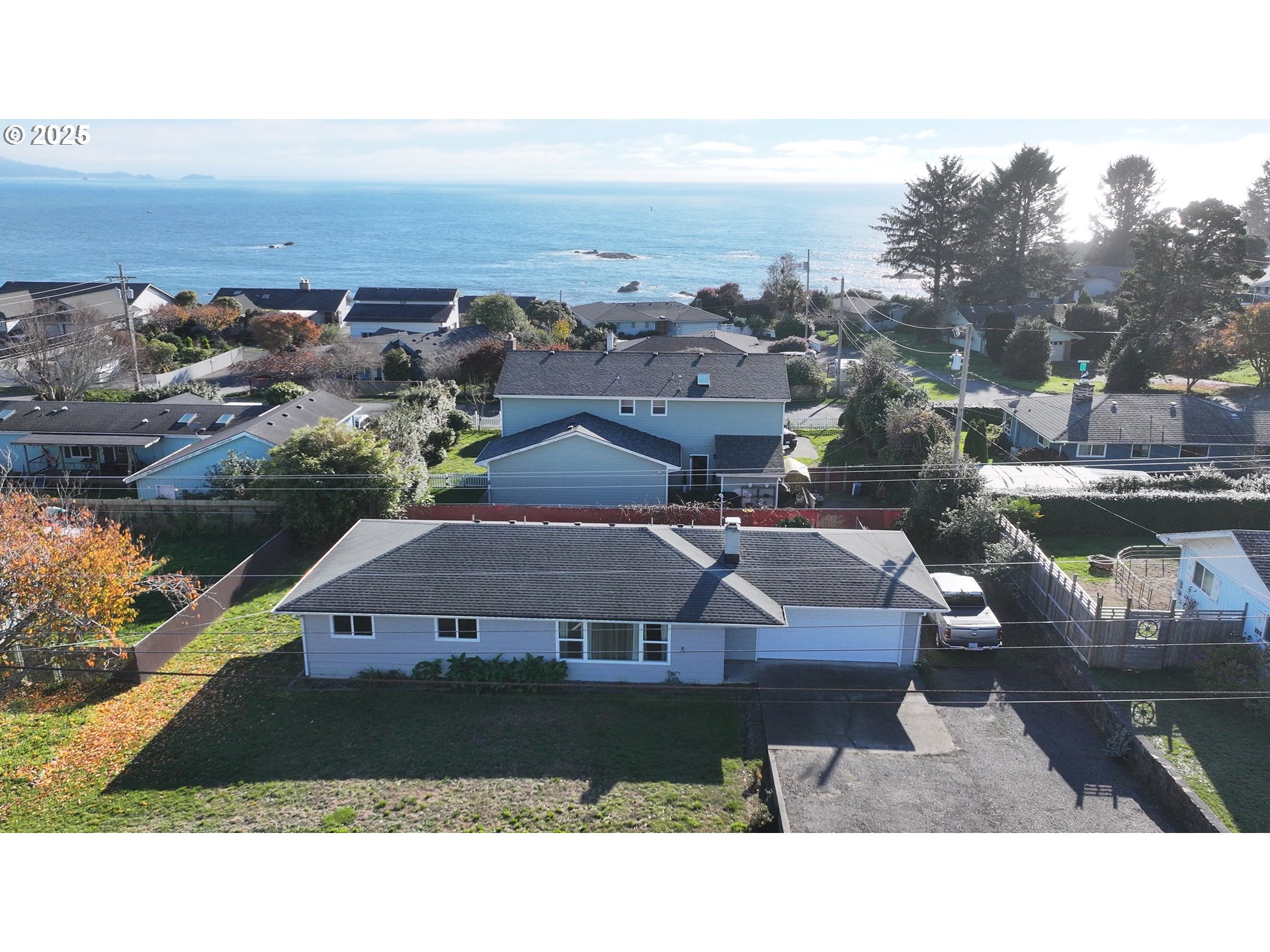 425 Memory Lane Brookings, OR 97415 - Photo 1 of 25 a aerial view of a house with a garden