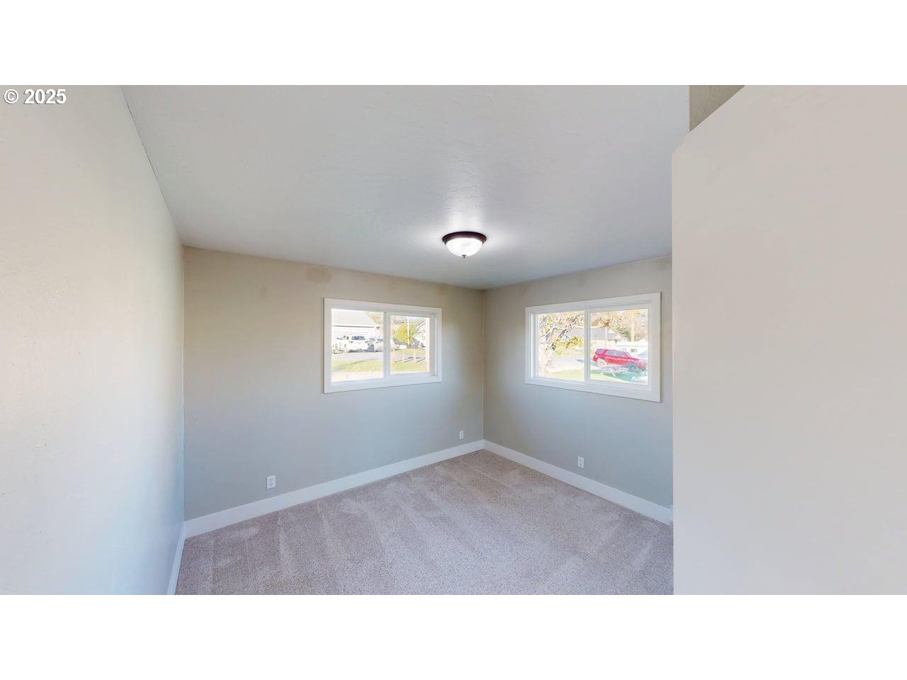 425 Memory Lane Brookings, OR 97415 - Photo 18 of 25 a open kitchen with window and a white wall