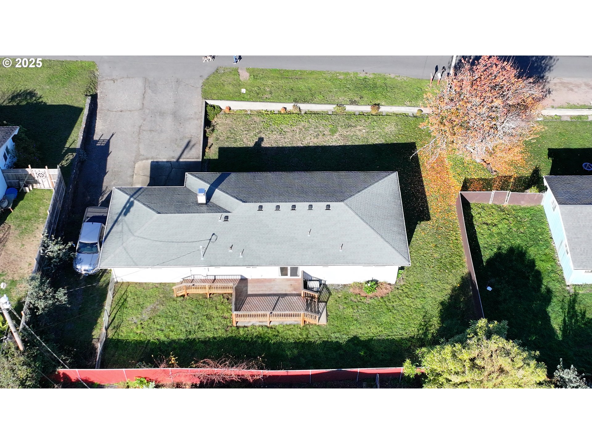 425 Memory Lane Brookings, OR 97415 - Photo 23 of 25 an aerial view of a house with a yard and outdoor seating