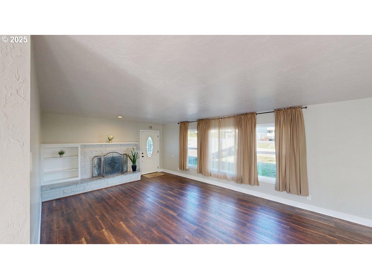 425 Memory Lane Brookings, OR 97415 - Photo 3 of 25 a bathroom with a sink and a large window
