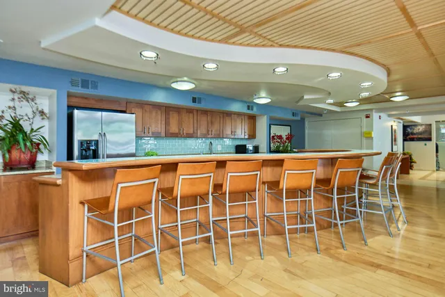 a spacious bathroom with a tub and shower