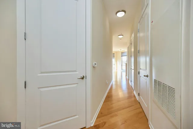 a view of a bathroom from the hallway