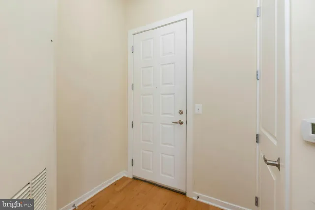 a view of room with hardwood floor
