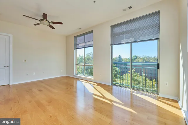 a view of a room with a large window
