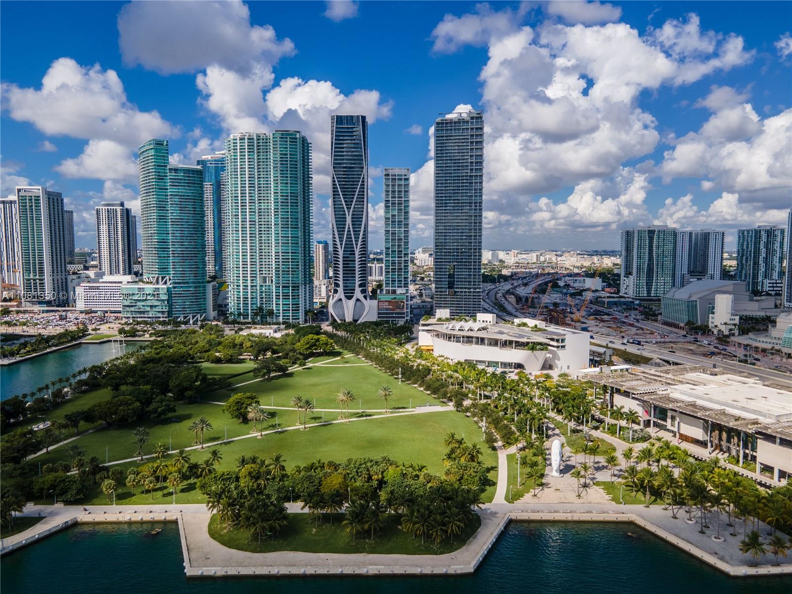 1040 Biscayne Boulevard, Unit 2403 Miami, FL 33132 - Photo 1 of 25 a view of a swimming pool with a patio
