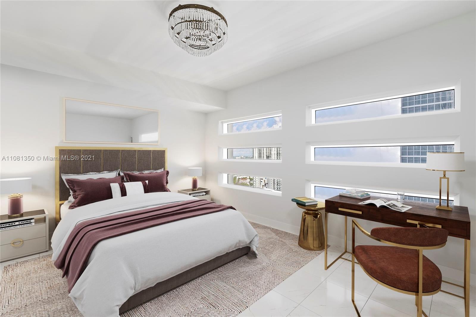 1040 Biscayne Boulevard, Unit 2403 Miami, FL 33132 - Photo 11 of 25 a bedroom with a bed and a window