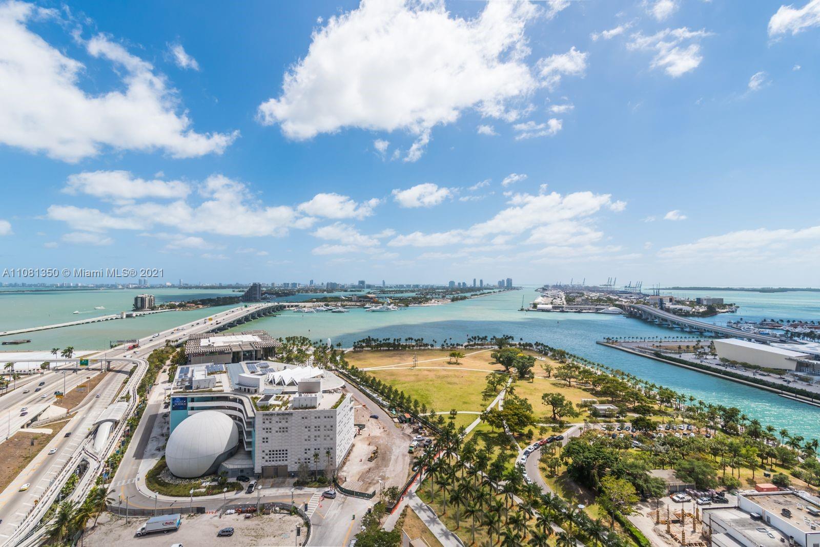 1040 Biscayne Boulevard, Unit 2403 Miami, FL 33132 - Photo 25 of 25 an aerial view of a swimming pool with a yard