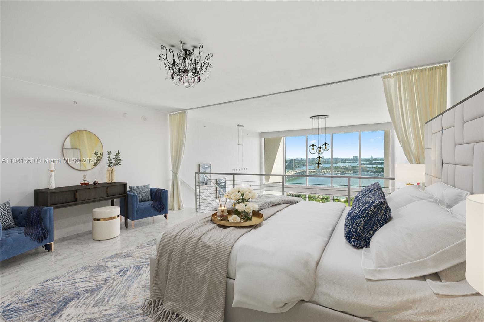 1040 Biscayne Boulevard, Unit 2403 Miami, FL 33132 - Photo 10 of 25 a living room with furniture flowerpot and a window