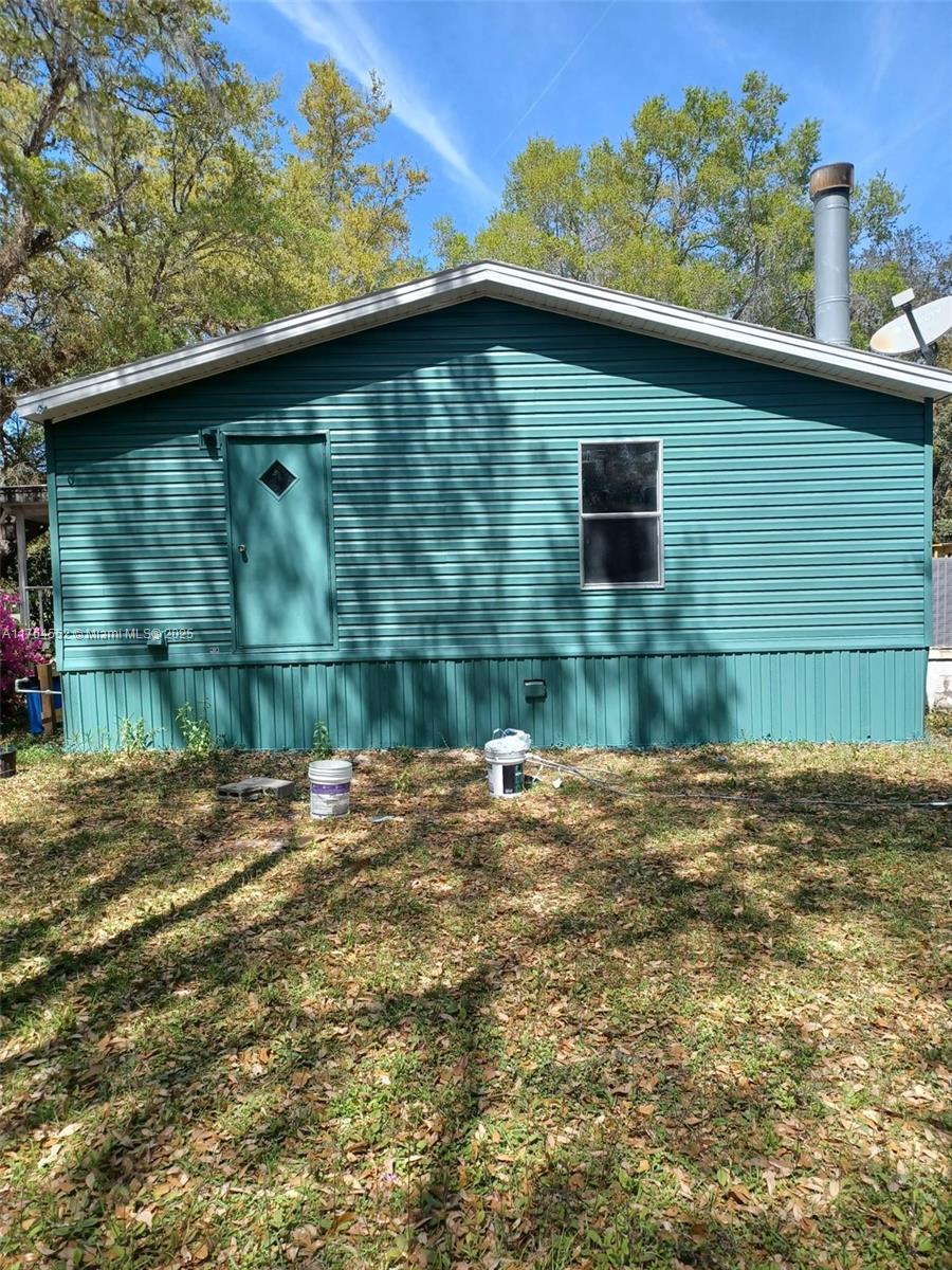 18520 Wildlife Trail Spring Hill, FL 34610 - Photo 12 of 12 a backyard of a house