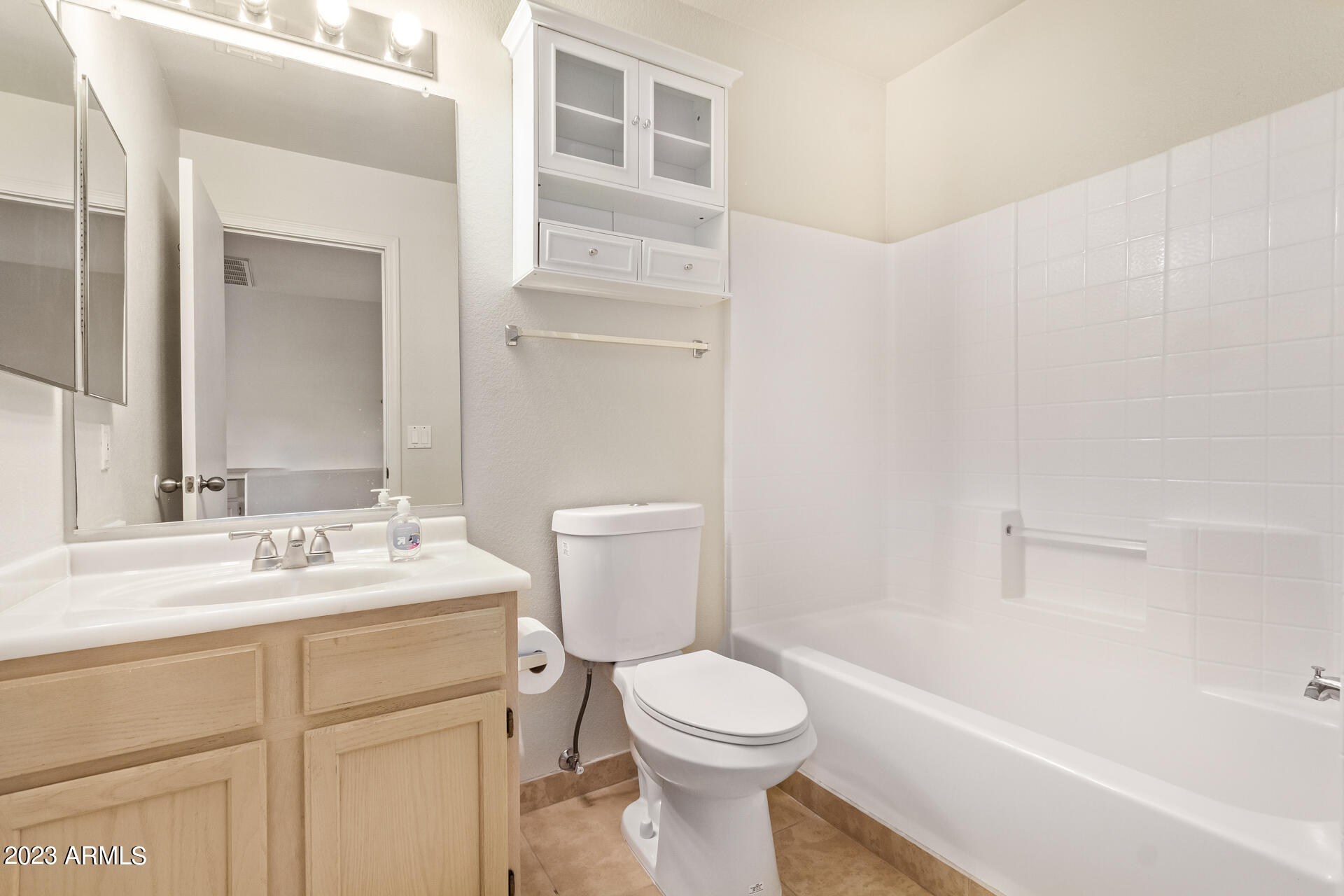 1310 East Angela Drive Phoenix, AZ 85022 - Photo 15 of 19 a bathroom with a sink a toilet and shower