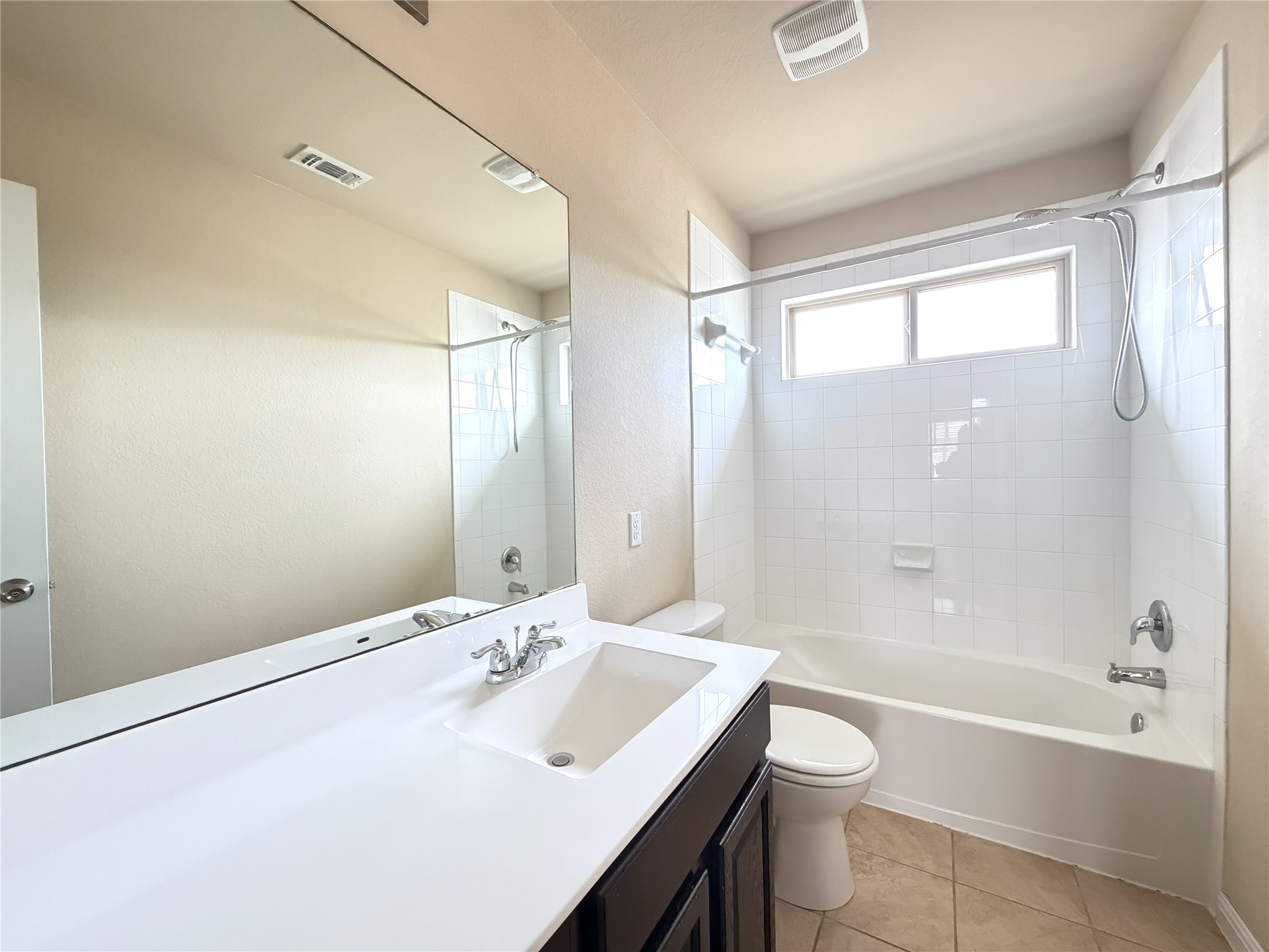 1437 Brooks Way Leander, TX 78641 - Photo 12 of 16 a bathroom with a sink a toilet and shower