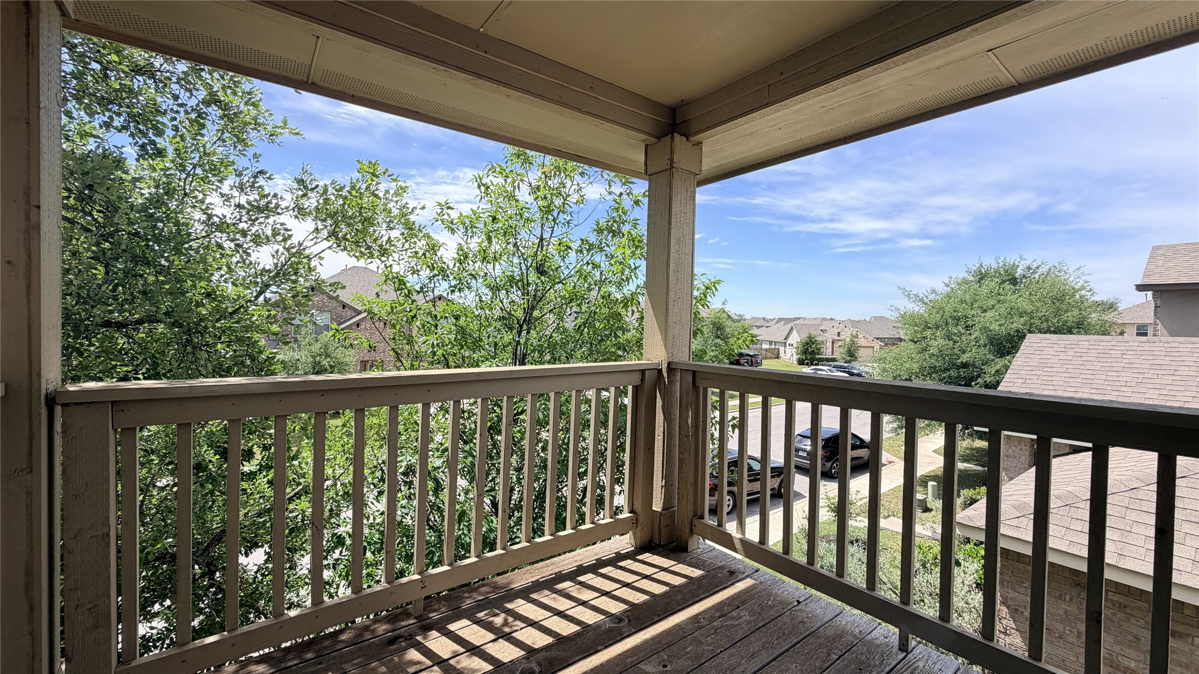 1437 Brooks Way Leander, TX 78641 - Photo 13 of 16 a view of a balcony with wooden floor