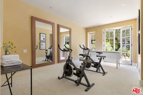 a view of a livingroom with furniture and windows