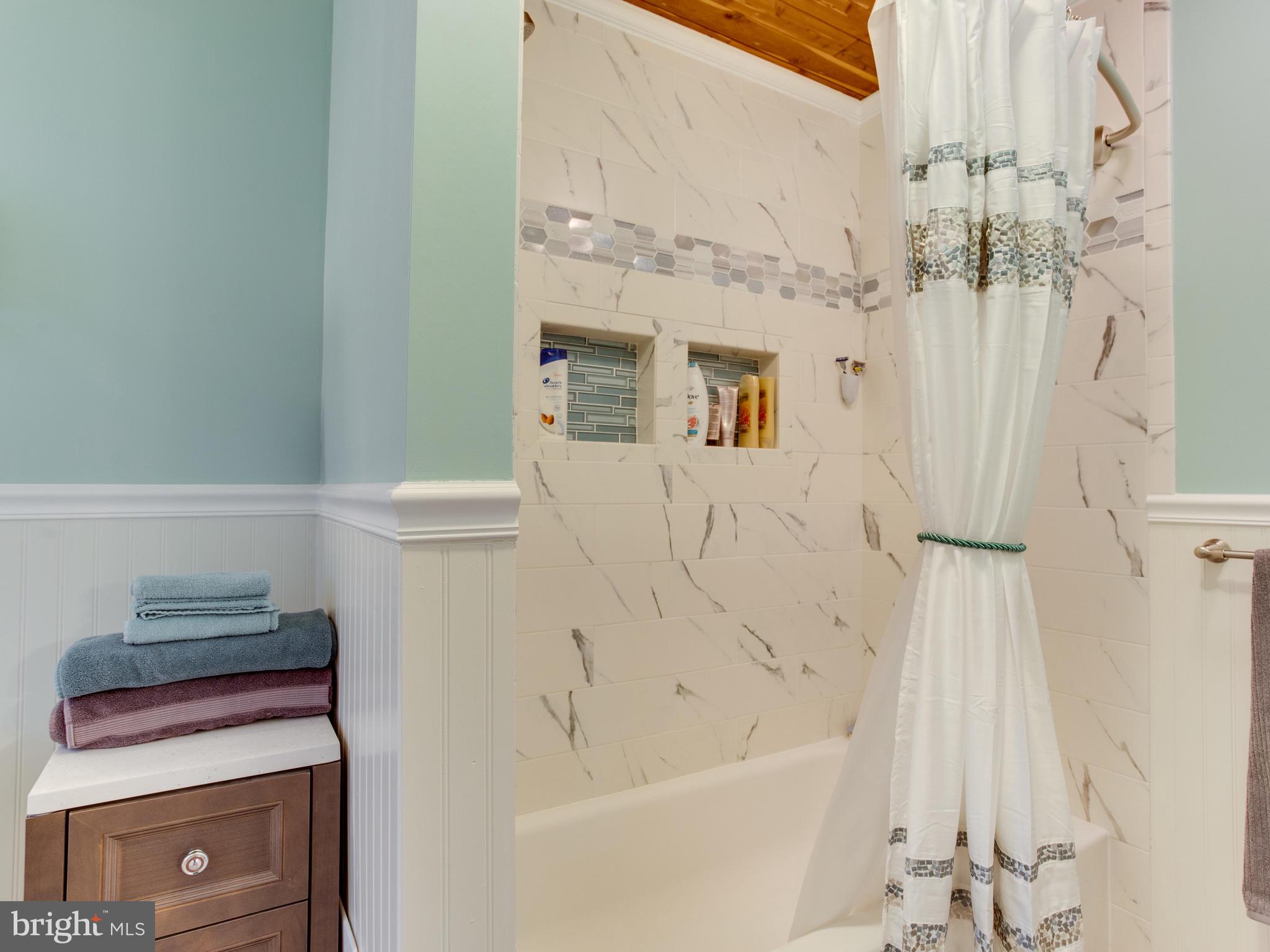 950 Mayo Road Edgewater, MD 21037 - Photo 23 of 46 Updated tub/shower combination with inset shelves